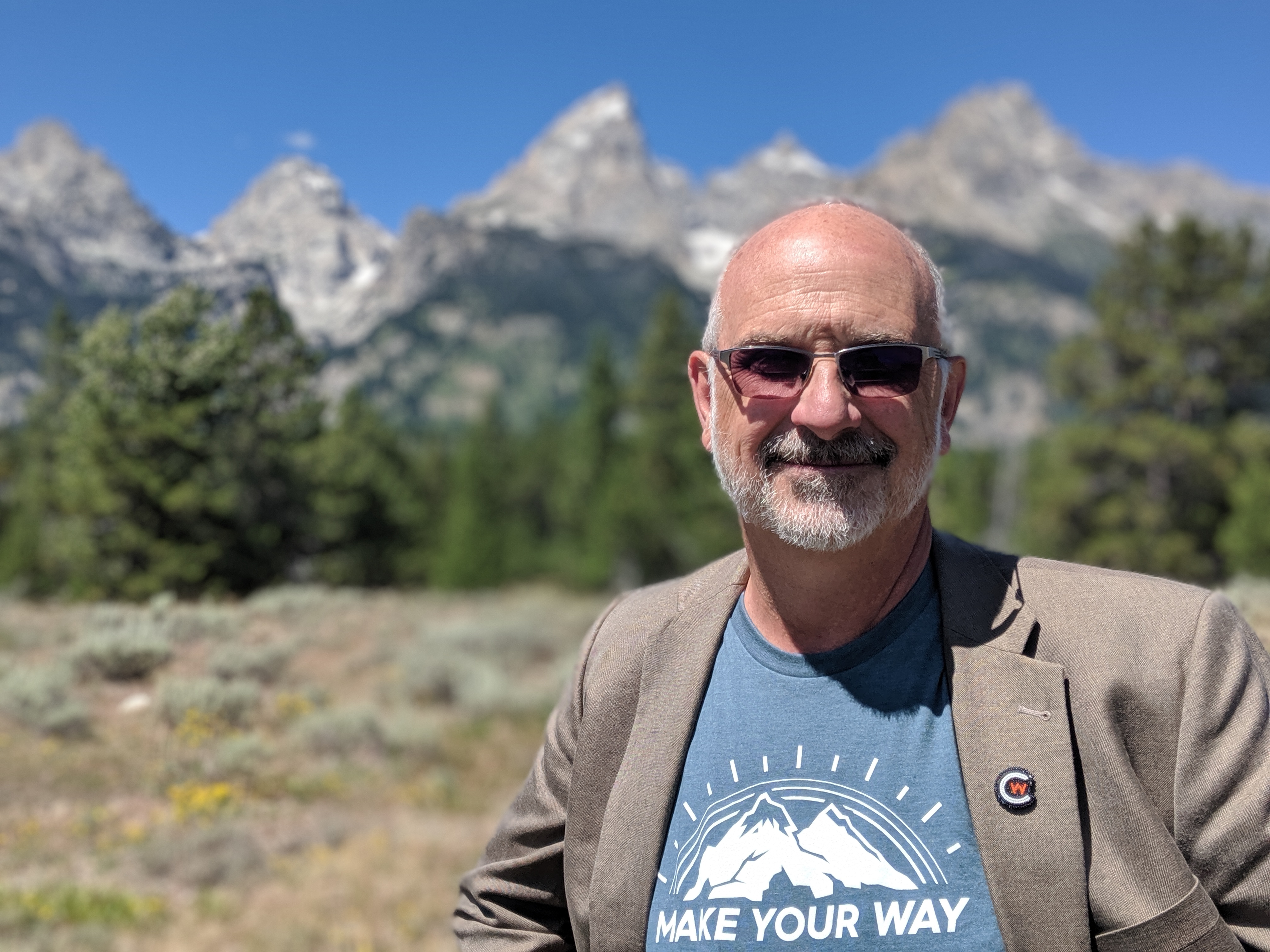 photo of CWC president Brad Tyndall in front of the Teton mountains