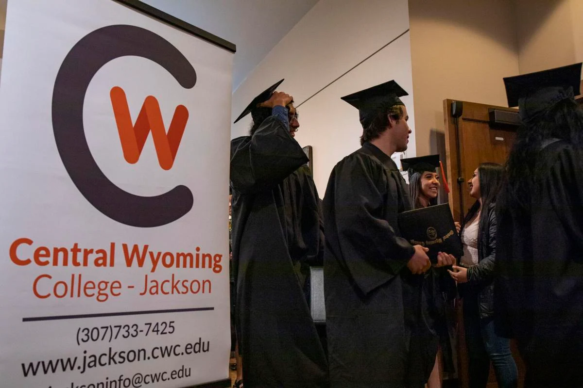 Students celebrating graduation at CWC Jackson