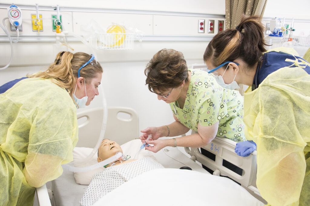Nursing students treating simulated patients