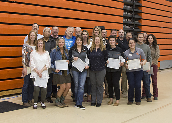 CWC employees in a group photo for being club advisors