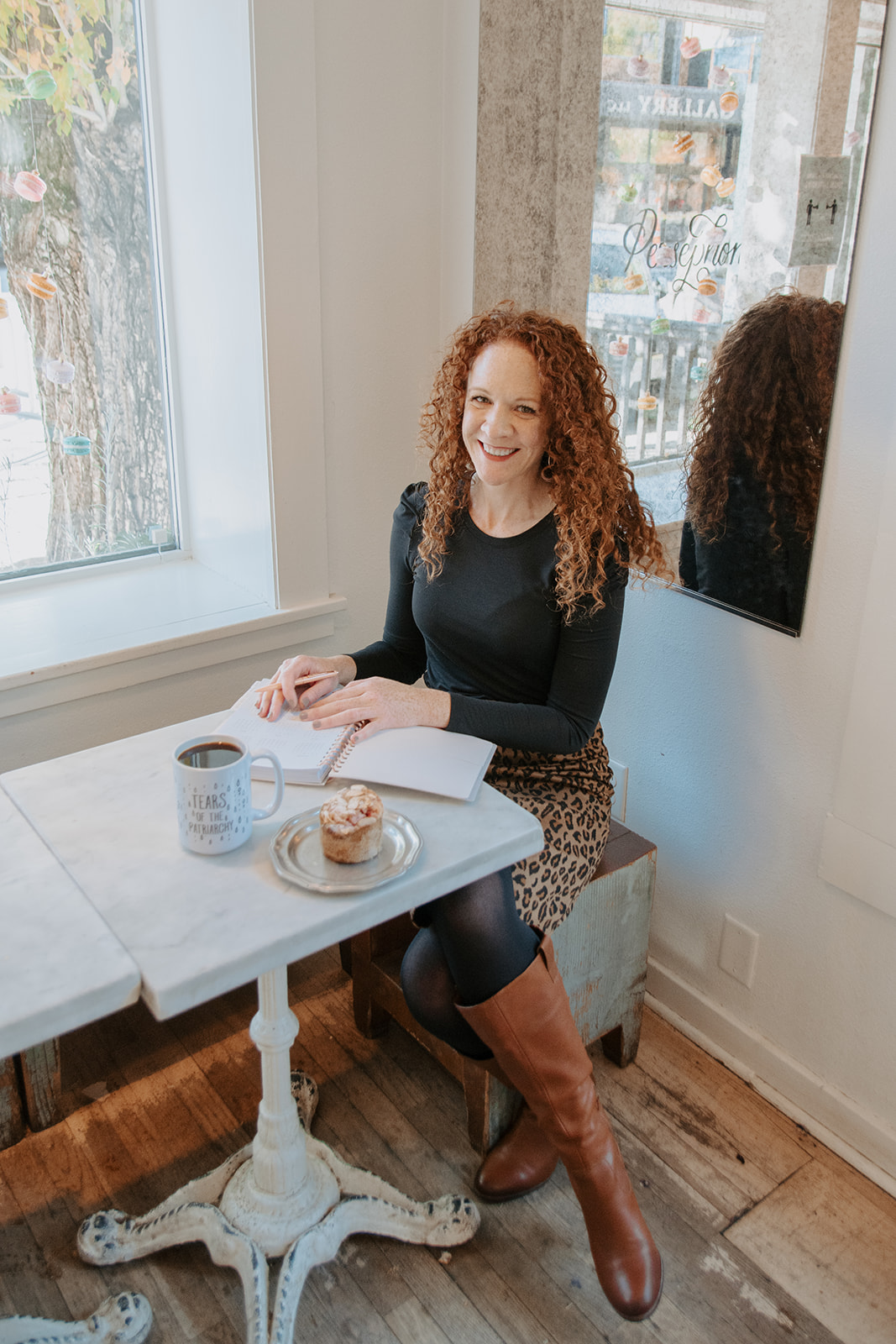 portrait of Heather Smith sitting at a table