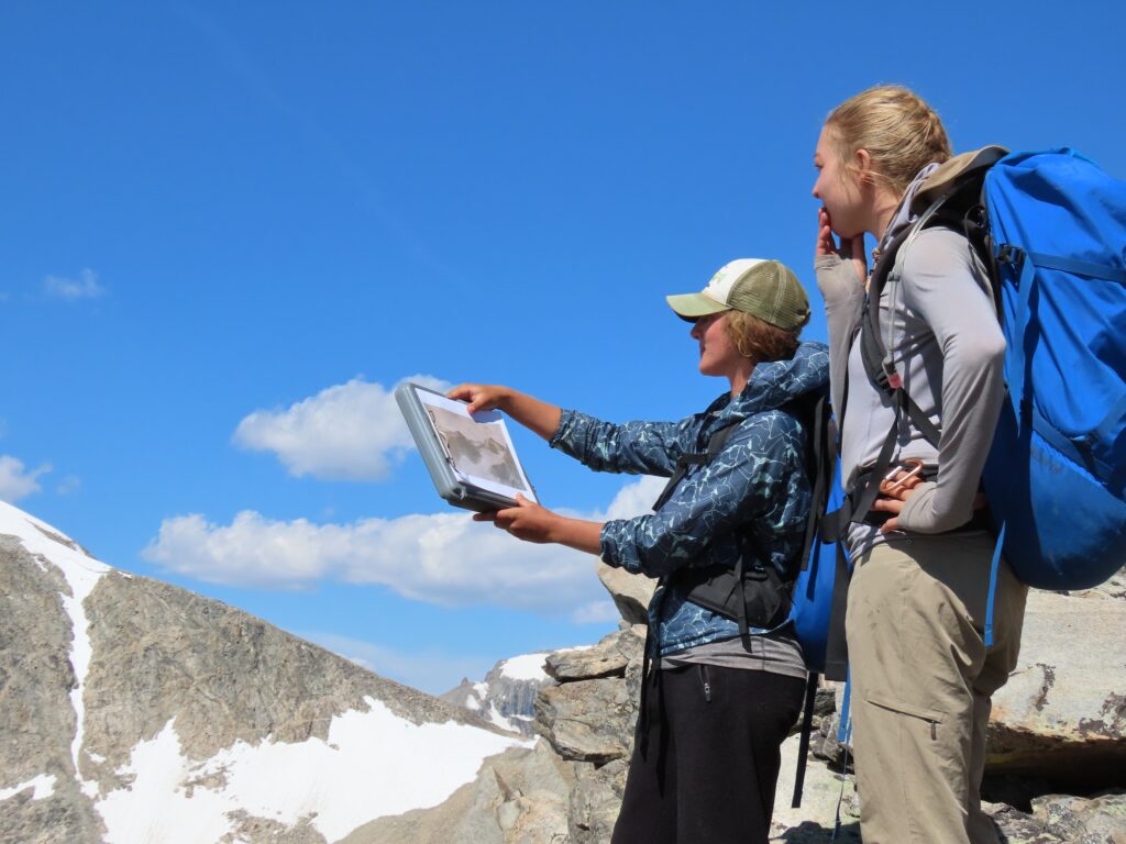 two ICCE students work on photographing the glaciers in the Wind River Range