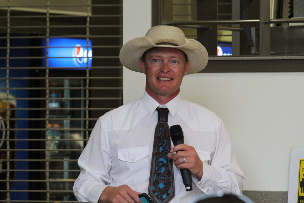 Tyler McCann announcing the Beef Roundup