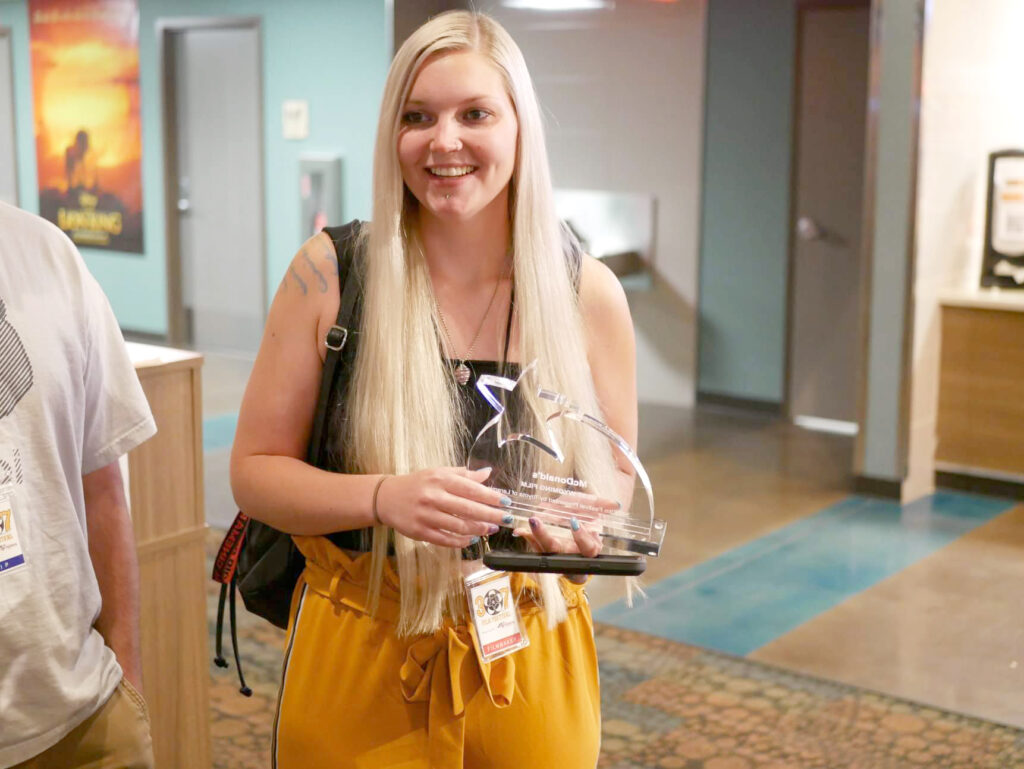 Falon Noonan holds her film trophy