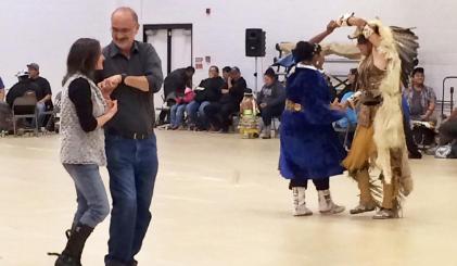 President Tyndall and his wife Audrey dance at the annual Powwow