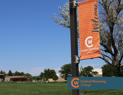 CWC Riverton Campus lightpole with orange welcome banner attached