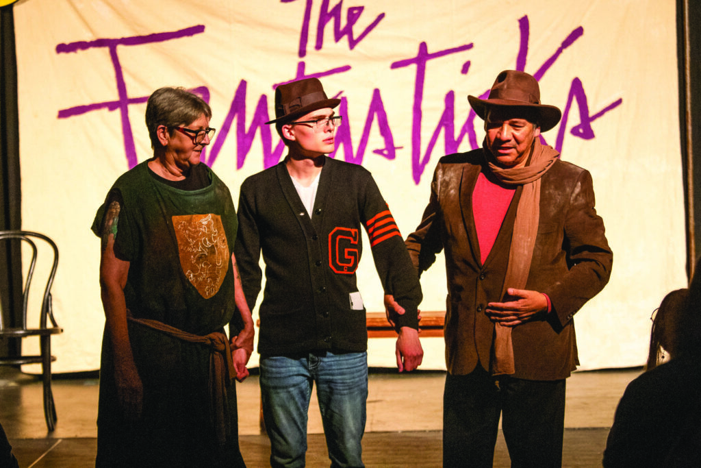 Pictures of actors performing in The Fantasticks play