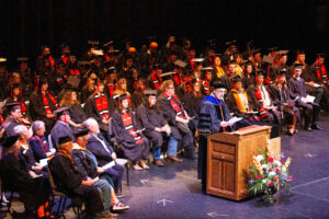Central Wyoming College graduates celebrating during the 2026 commencement ceremony in Riverton, Wyoming, honoring student achievement and distinguished community leaders.